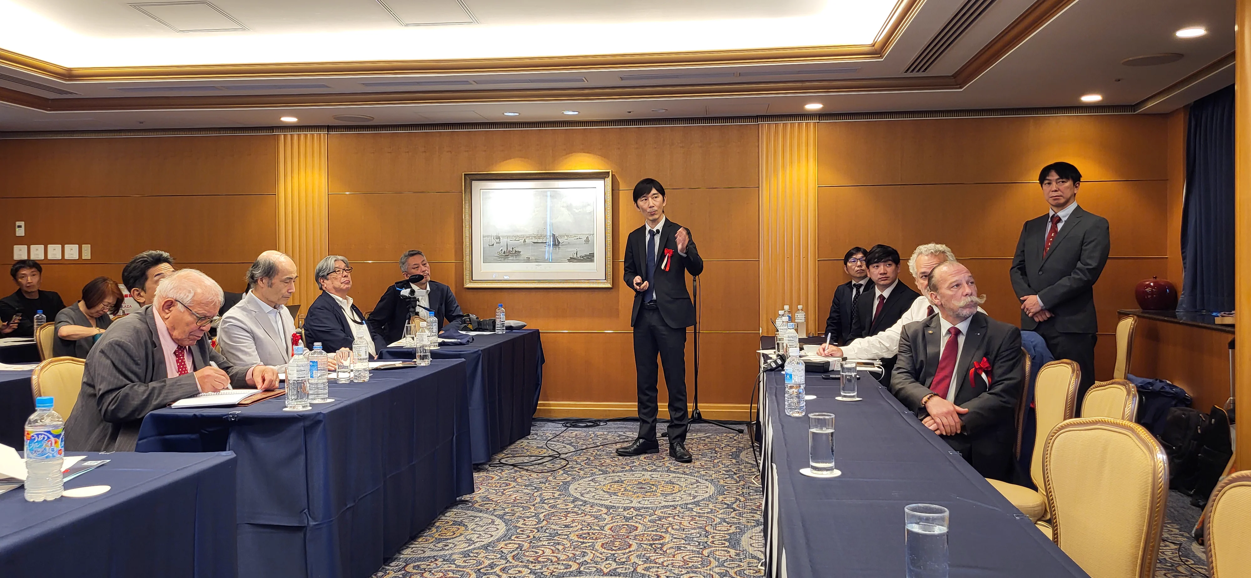Speaker addressing the symposium — Yokohama 2025